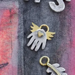 Little Winged Hand Charm